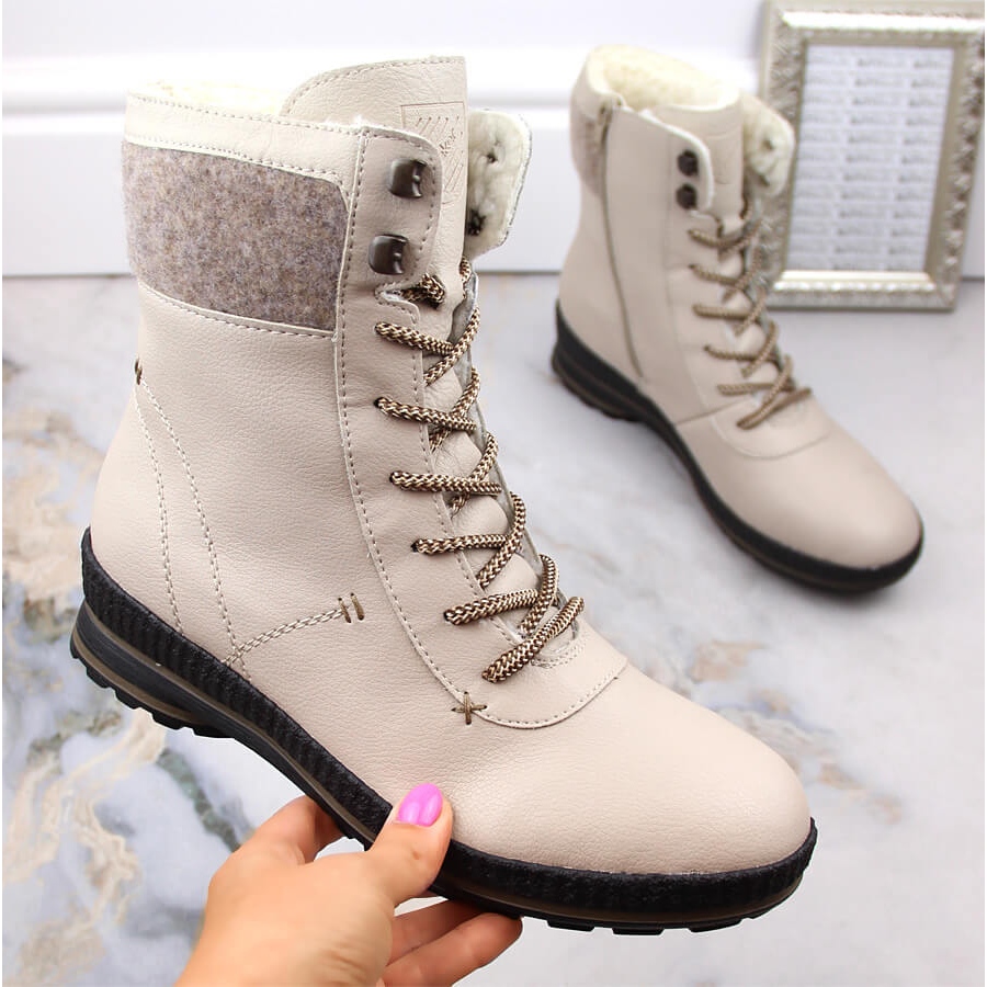 bottes-rieker-femme-405pme-1.jpg Bottes confortables en cuir pour femmes Rieker Beige – Image 1