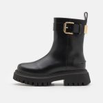 Maje Bottines à plateau noir ZALANDO.FR